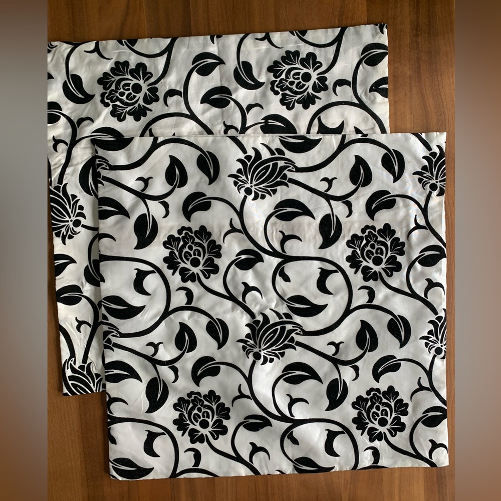 NWOT Pair Pillow Covers Floral Polyester Black and White. 17.5” square.